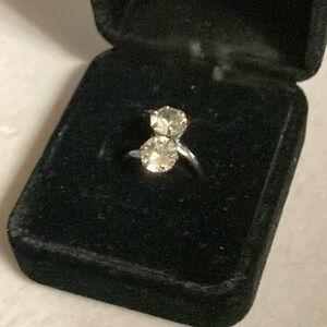 Sterling silver twist style two CZS size approximately 4.5 .